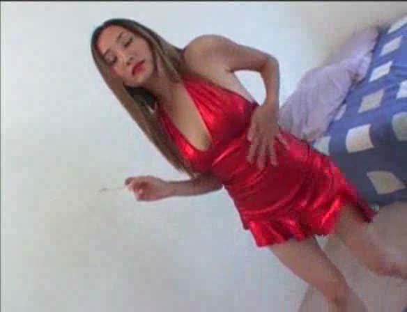 Big Asian tits look great in shiny red outfit